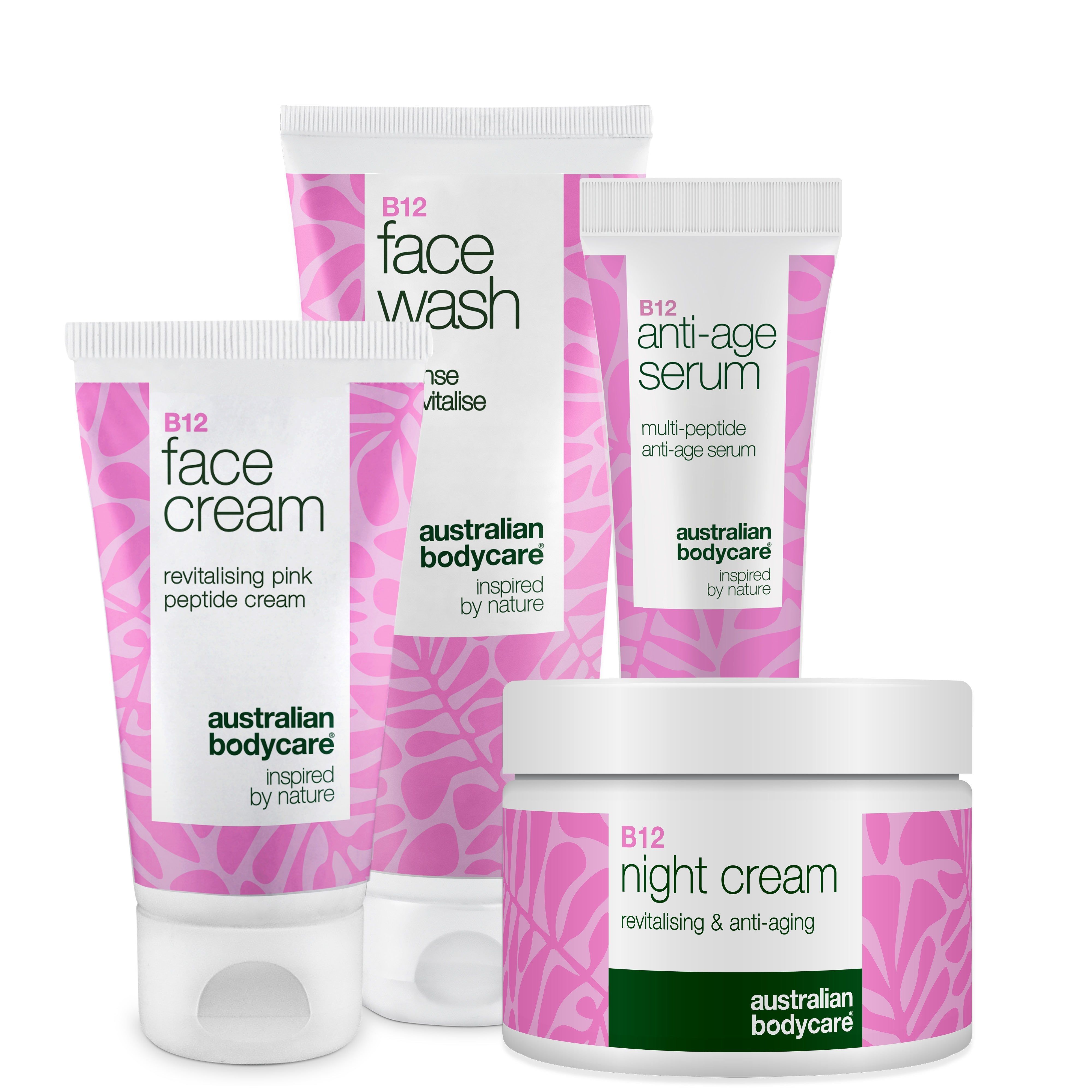 Set mit Gesichtscreme, Waschgel, Nachtcreme und Anti-Age-Serum. Rosa und weiße Verpackung mit Blättermuster.