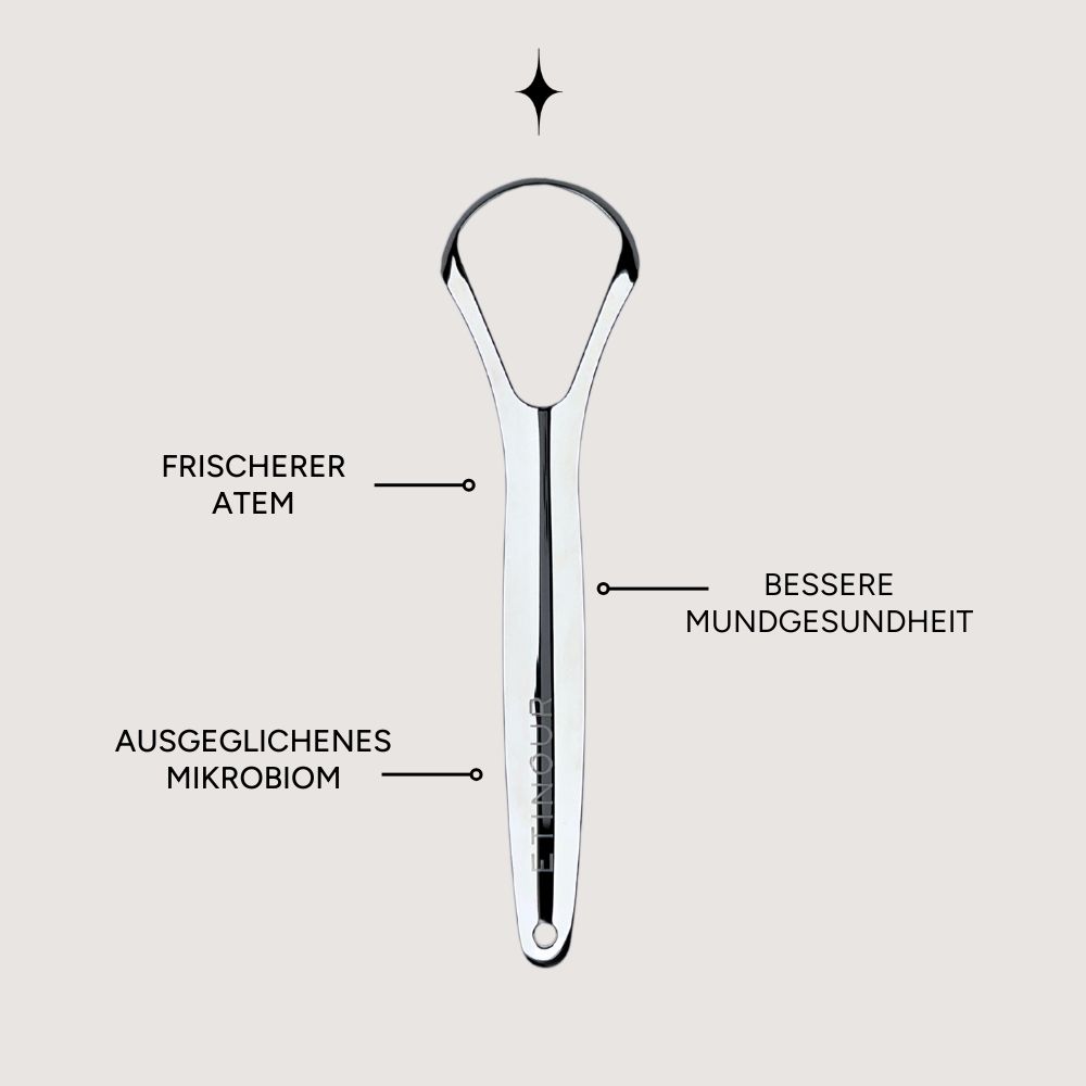 Zungenschaber aus Edelstahl. Beschriftung: Frischerer Atem, Bessere Mundgesundheit, Ausgeglichenes Mikrobiom.