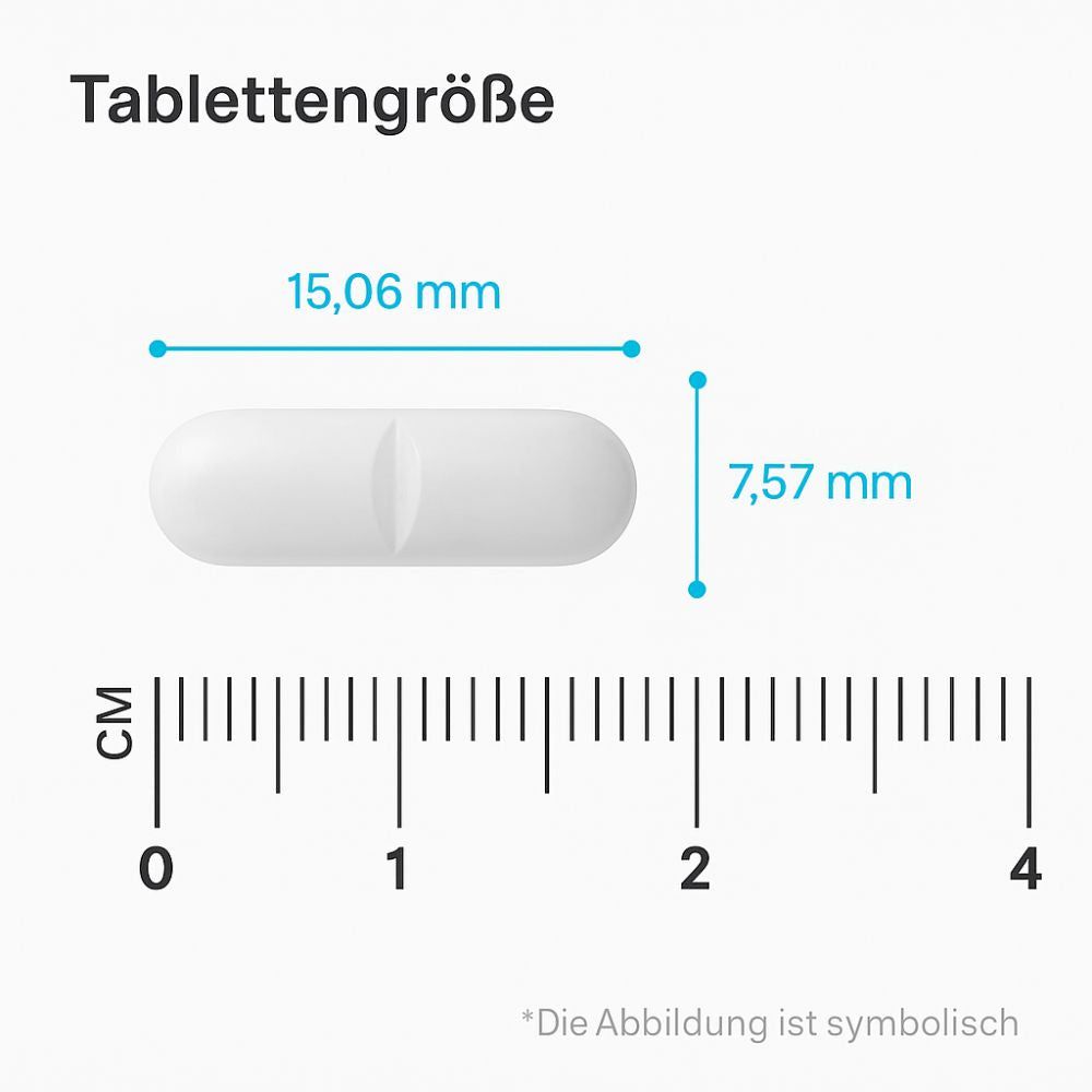 Weiße Tablette mit einer Nut. Maße: 15,06 mm x 7,57 mm. Skala in cm.