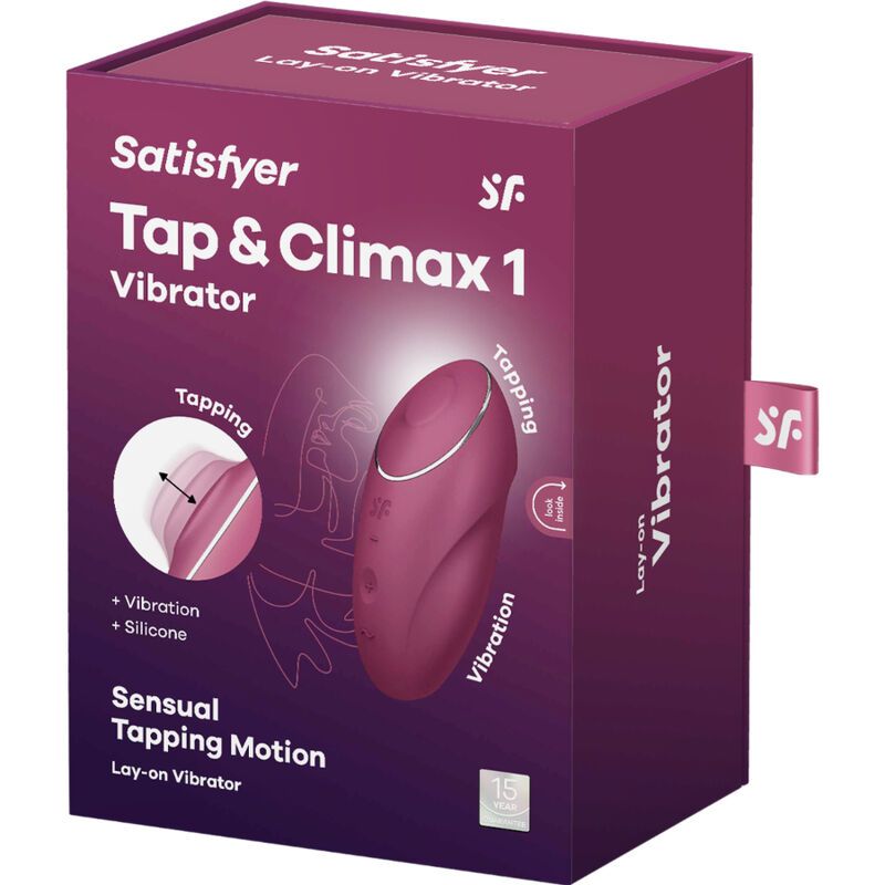 Verpackung mit Produktabbildung. Text: 'Satisfyer Tap & Climax 1 Vibrator'. SF-Logo. 'Lay-on Vibrator'.
