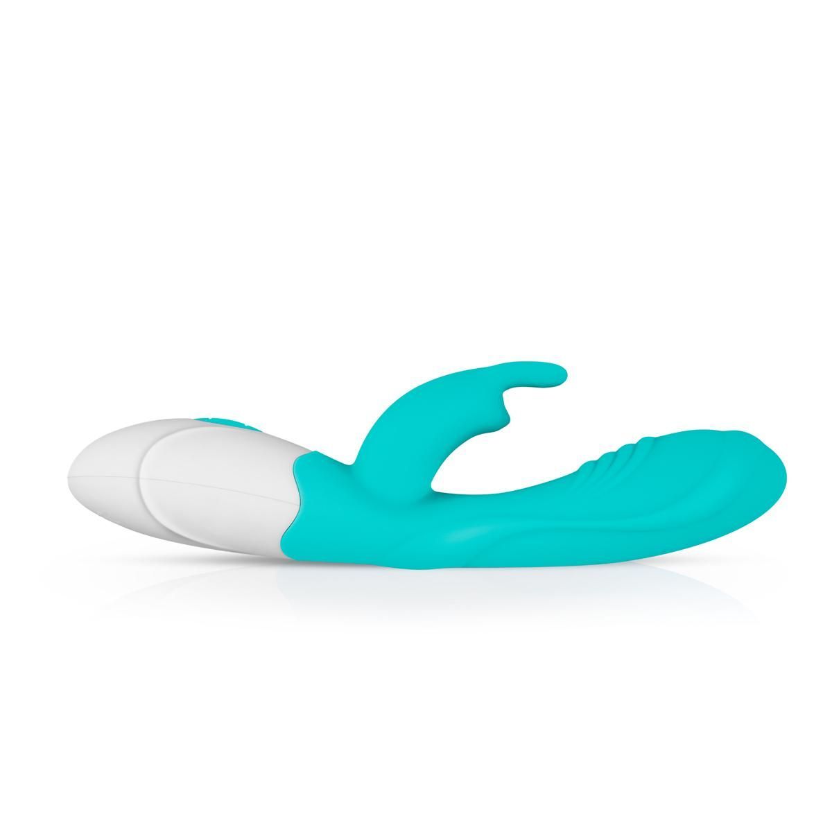 Türkis-weißer Vibrator. Form mit gebogener Spitze und abgerundetem Ende.
