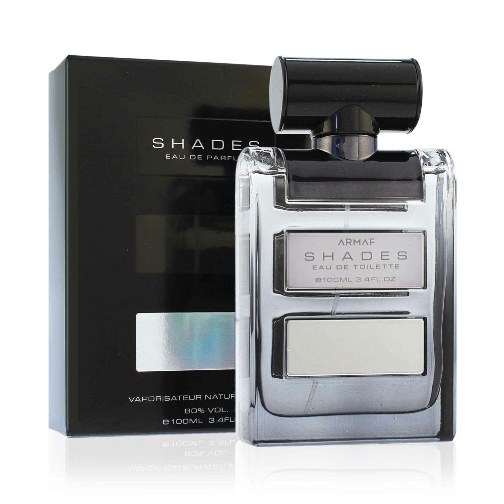 Schwarze Schachtel und Flakon. Flakon mit drei rechteckigen Feldern. Text: ARMAF SHADES Eau de Parfum. 100ml 3.4FL OZ.