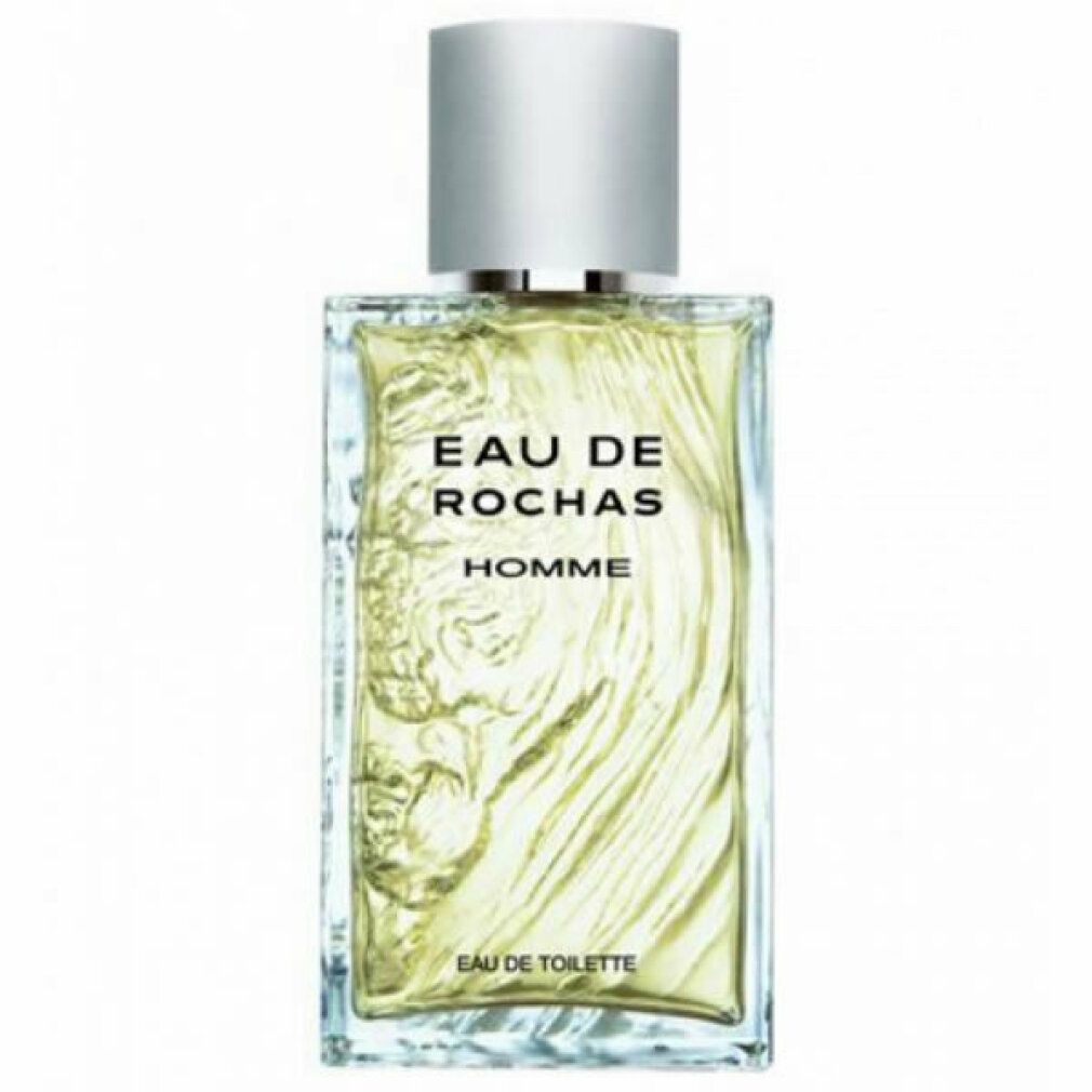 Rechteckiger Flakon mit silbernem Deckel. Aufschrift: EAU DE ROCHAS HOMME. Unterhalb: EAU DE TOILETTE.