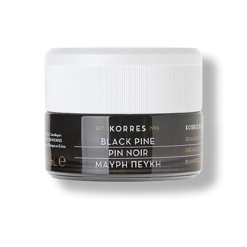 Schwarze Creme in einem Glasbehälter mit weißem Deckel. Beschriftung: Black Pine, Pin Noir, Μαύρη Πεύκη. Marke: KORRES.