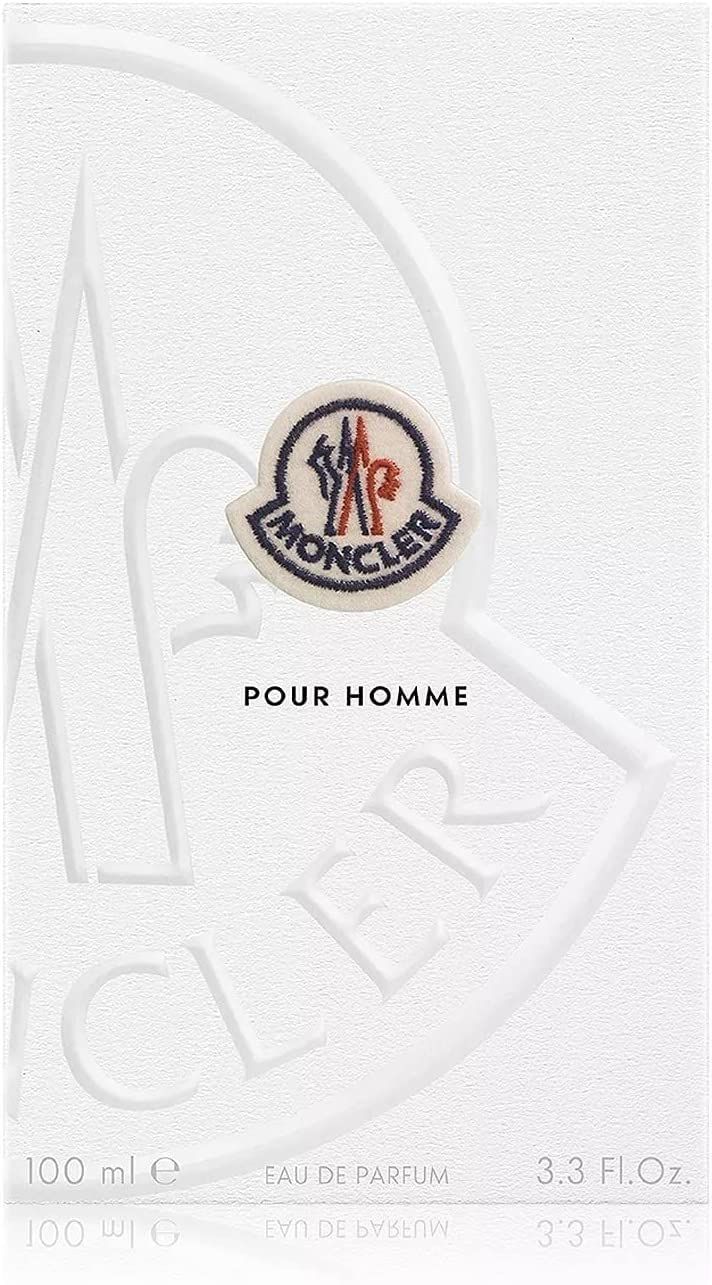 Weiße Verpackung mit Logo und Schriftzug POUR HOMME. MONCLER-Logo.