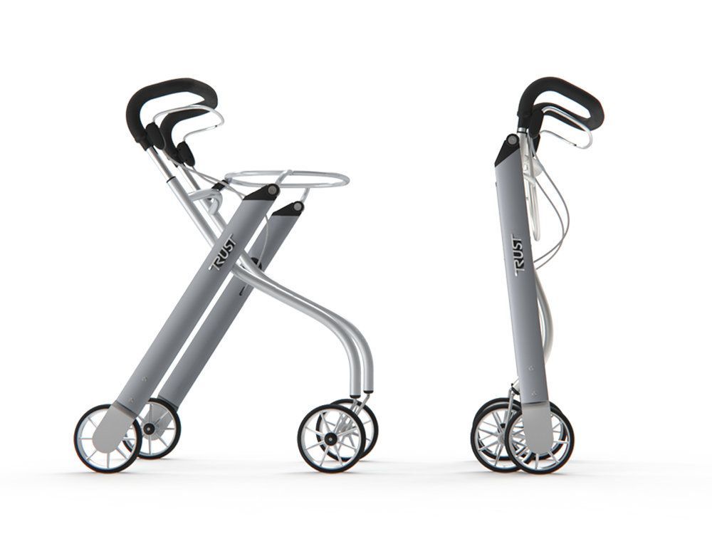 Gefalteter Rollator, silberfarben, mit vier Rädern. Marke Trust.