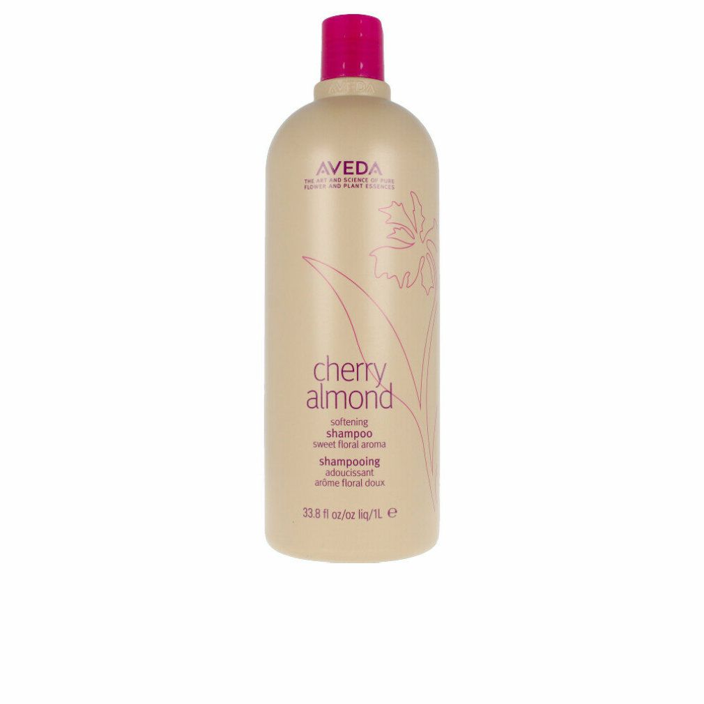 Beige Shampoo-Flasche mit pinkfarbenem Deckel. Aufschrift: Aveda, Cherry Almond, Shampoo. 33.8 fl oz/1L.