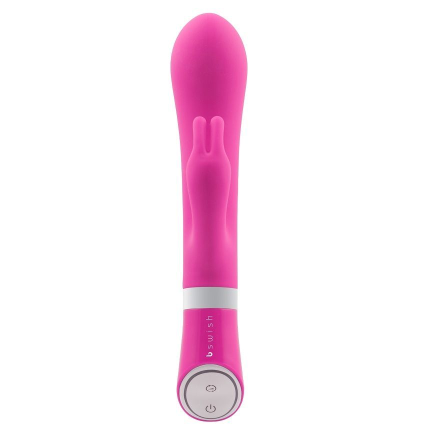 Rosa Vibrator mit gebogener Form und einem zusätzlichen Element. Mit zwei Knöpfen.