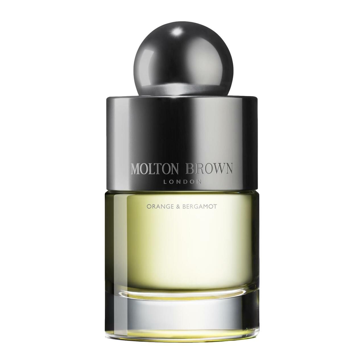 Glasflakon mit silbernem Verschluss. Aufschrift: Molton Brown, Orange & Bergamot. Gelbe Flüssigkeit sichtbar.