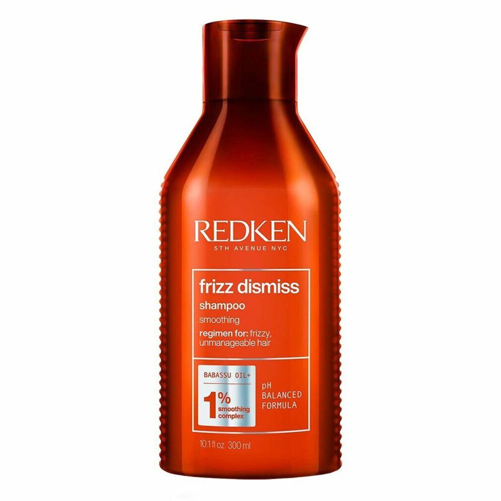 Rote Redken Frizz Dismiss Shampoo Flasche. Enthält Text: Shampoo, pH-ausgewogene Formel, 1% Smoothing Complex.