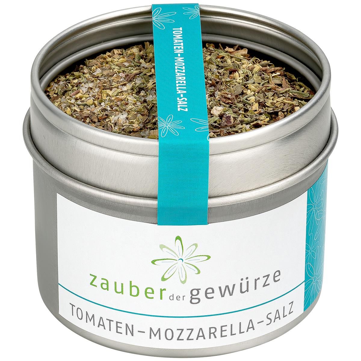 Runde Dose mit Kräutersalz. Türkisfarbenes Band mit Produktnamen. Weißes Etikett mit Logo und Produktbezeichnung.