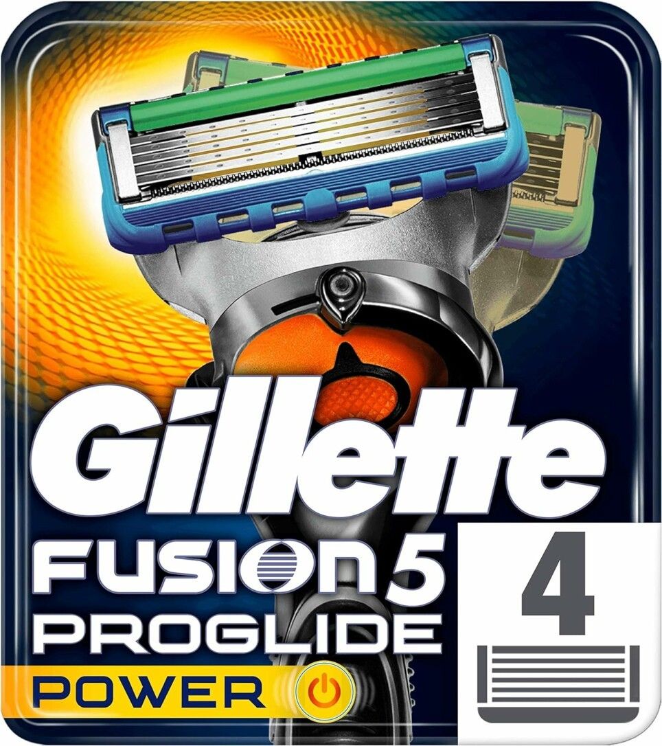 Rasierklingen mit grünem und blauem Element. Aufschrift: Gillette Fusion 5 ProGlide Power. Packung mit 4 Klingen.