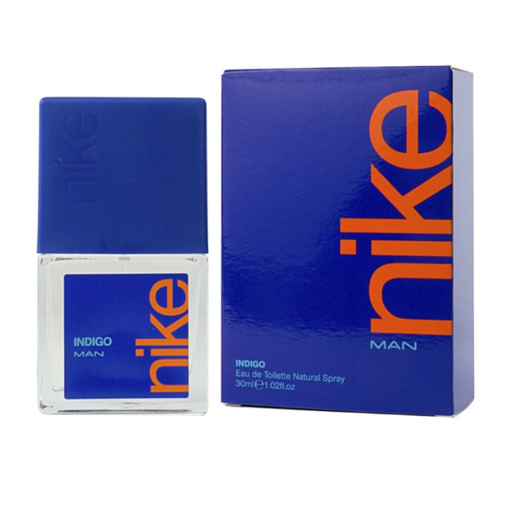 Nike Indigo Man Eau de Toilette. Flakon und Verpackung in Blau. Orangefarbener Schriftzug "nike".