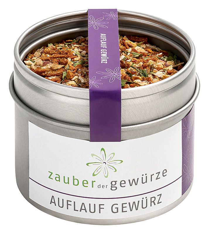 Metallbehälter mit Gewürzmischung. Aufkleber mit Schriftzug "Zauber der Gewürze Auflauf Gewürz". Lila Band mit Blumenmuster.