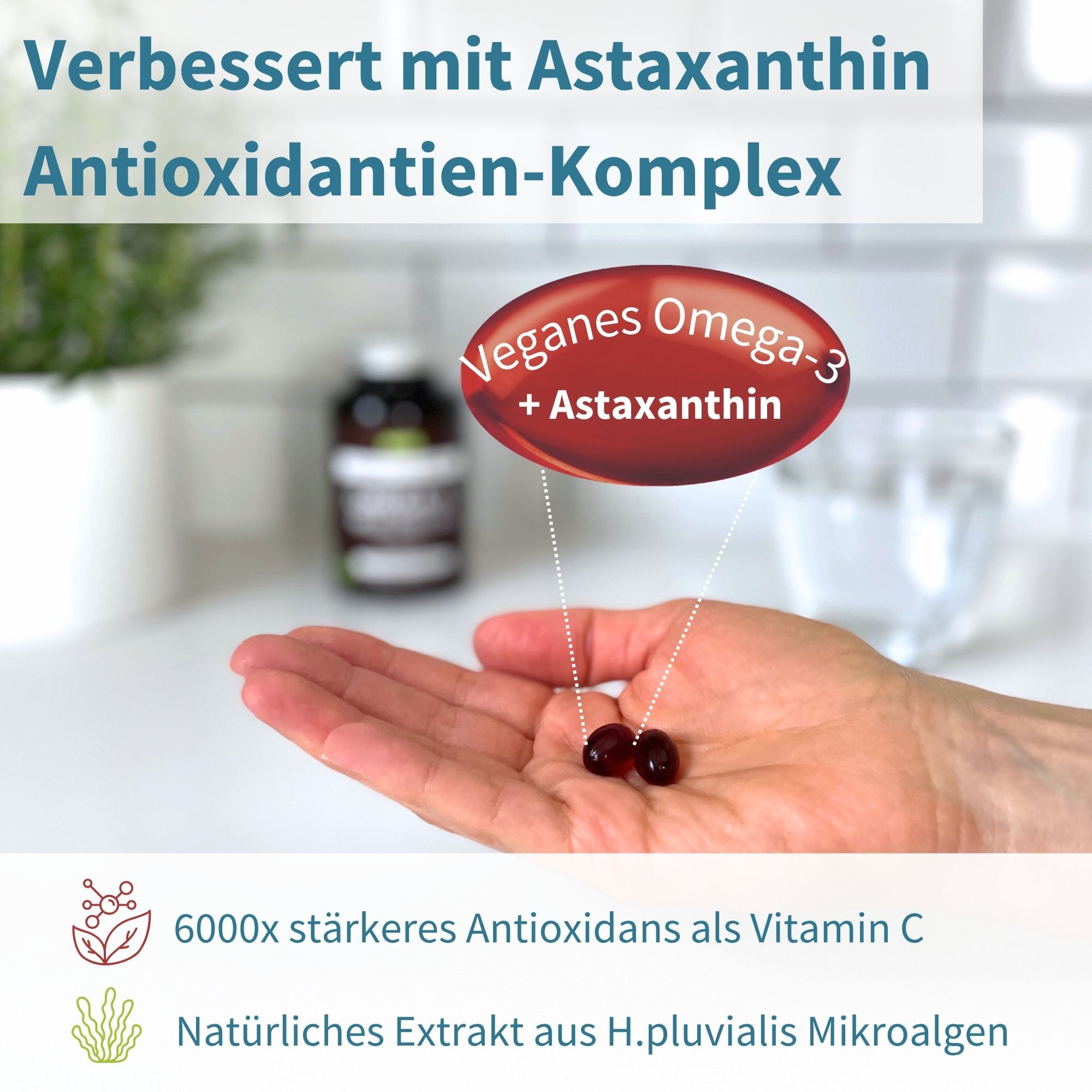 Hand hält zwei rote Kapseln, 'Veganes Omega-3 + Astaxanthin', starkes Antioxidans.
