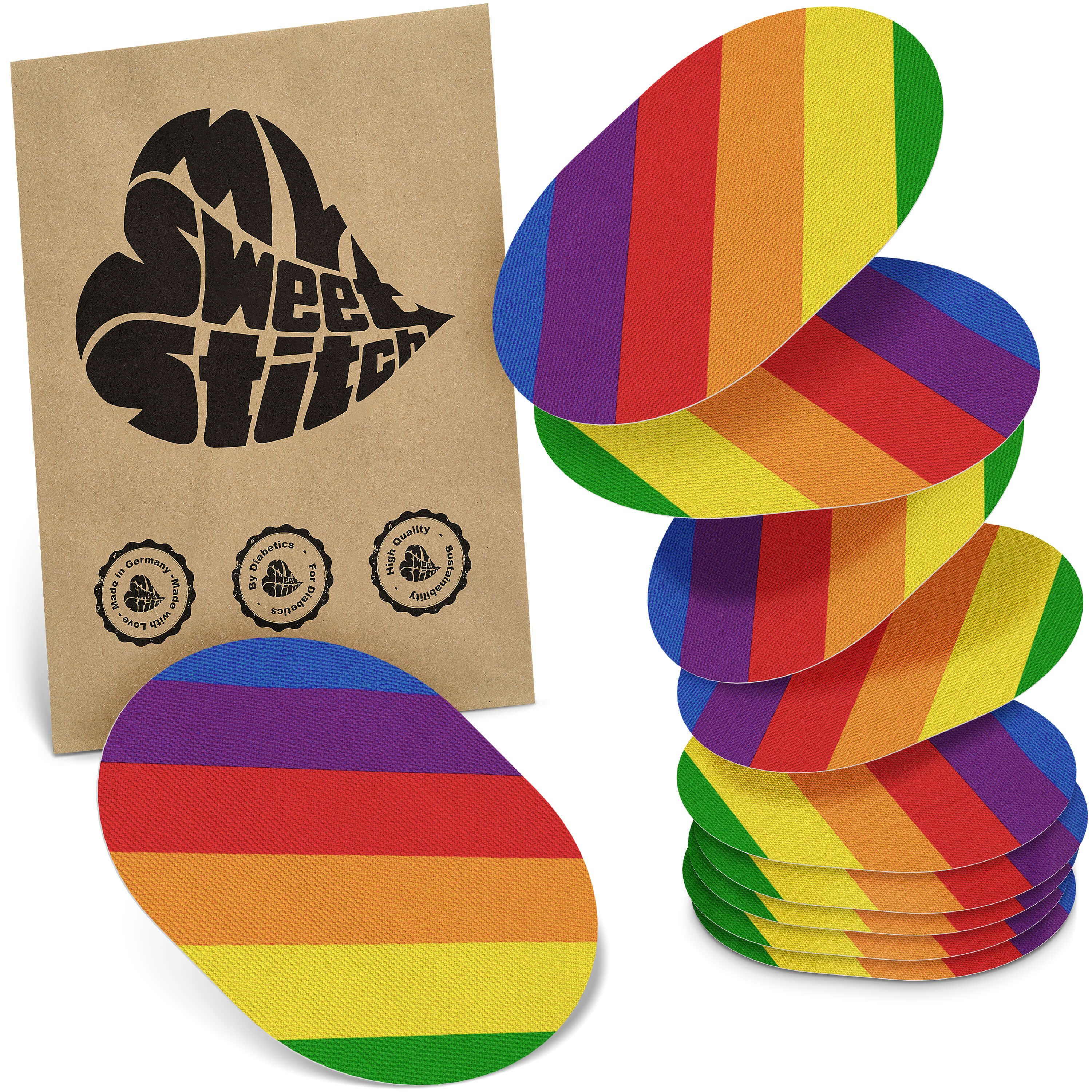 Mehrere ovale Pflaster mit Regenbogenmuster. Eine Packung mit Logo und Qualitätssiegeln. Pflaster sind gestapelt und einzeln.