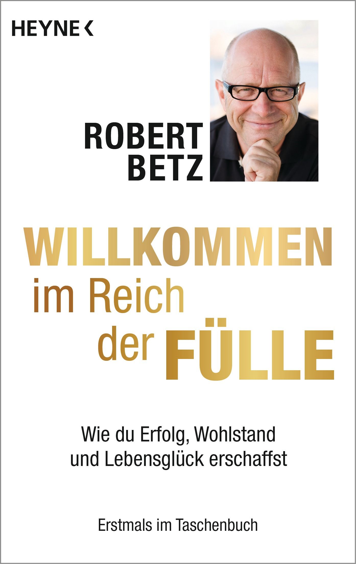 Buchcover mit Titel "Willkommen im Reich der Fülle" von Robert Betz. Verlag Heyne. Porträt des Autors.