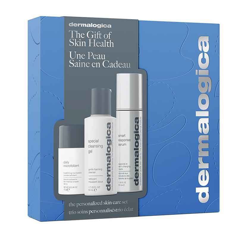 Geschenkset von Dermalogica. Blaue Box mit drei weißen Flaschen. Text: The Gift of Skin Health, Une Peau Saine en Cadeau, und Dermalogica.