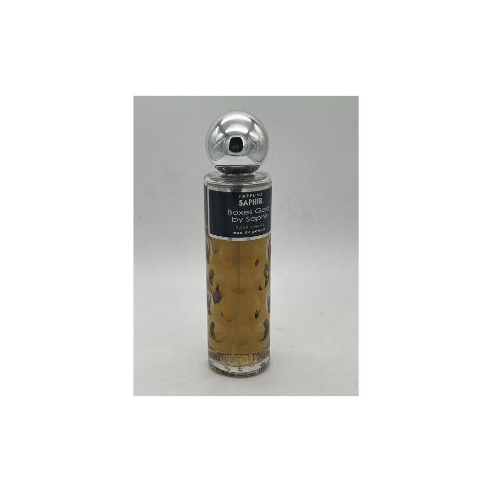 Parfümflasche mit silbernem Verschluss. Aufschrift: Saphir Boxes Gold by Saphir. Goldfarbene Flüssigkeit, zylindrische Form.