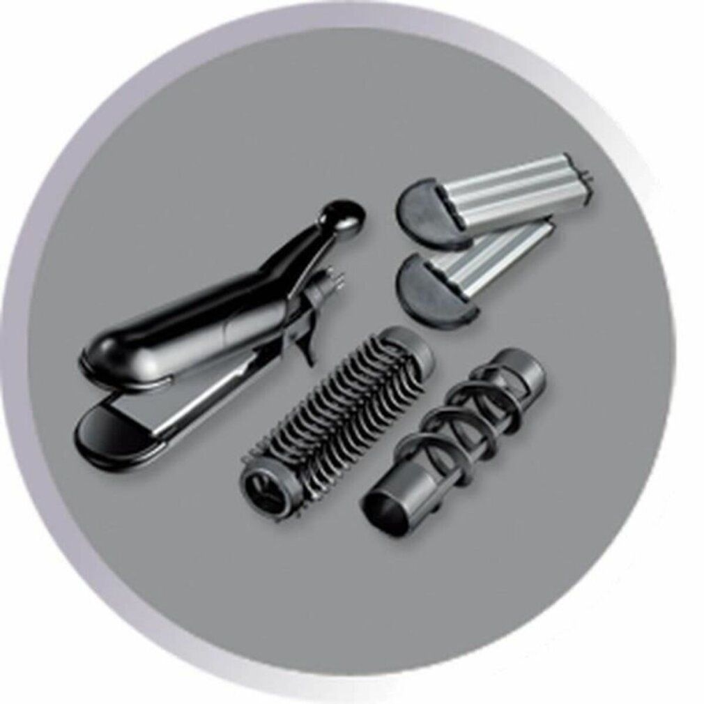 Nahaufnahme von Lockenstab-Aufsätzen. Glätteisen, Lockenwickler, gewellte Aufsätze. Auf grauem Hintergrund.