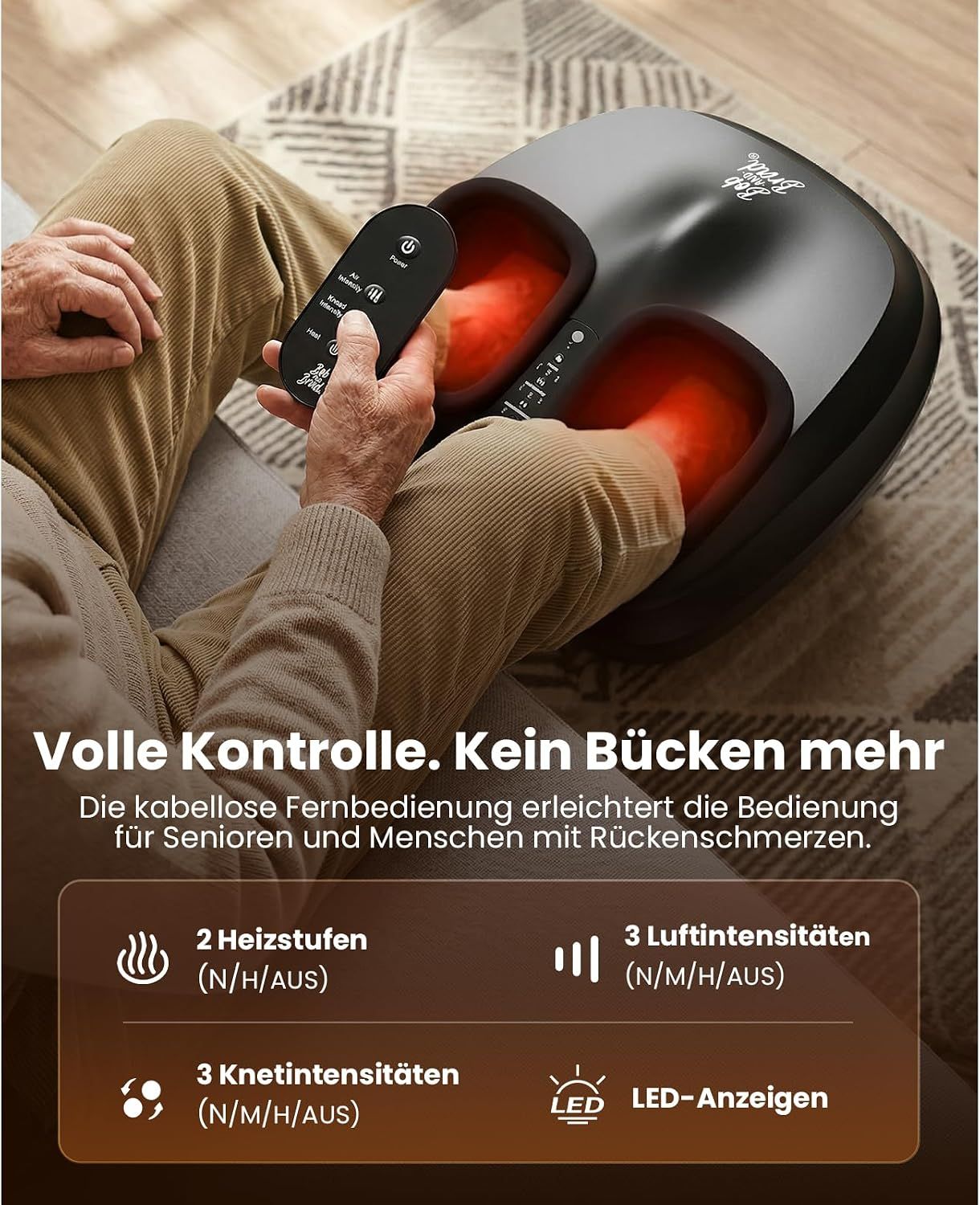Schwarzes Fußmassagegerät mit roten Heizelementen und Bedienelementen.