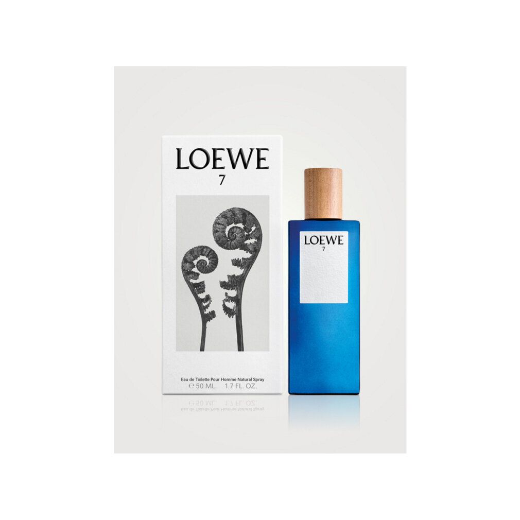 Parfümflakon und Verpackung. Flakon blau, rechteckig, Holzdeckel. Verpackung weiß mit Logo und Farn-Illustration.