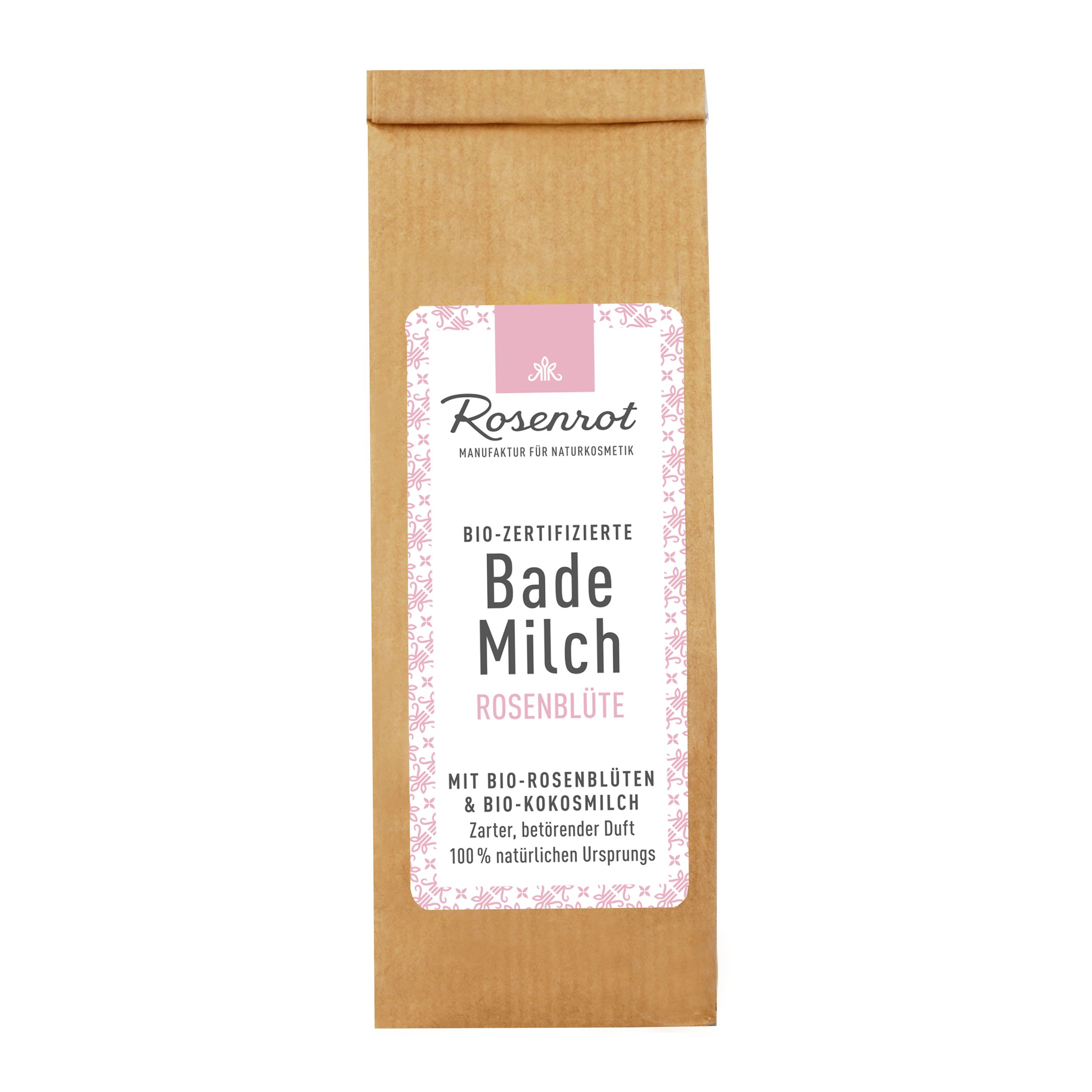Braune Papiertüte mit rosa Etikett. Text: Bademilch Rosenblüte, Bio-zertifiziert, Rosenrot Naturkosmetik.