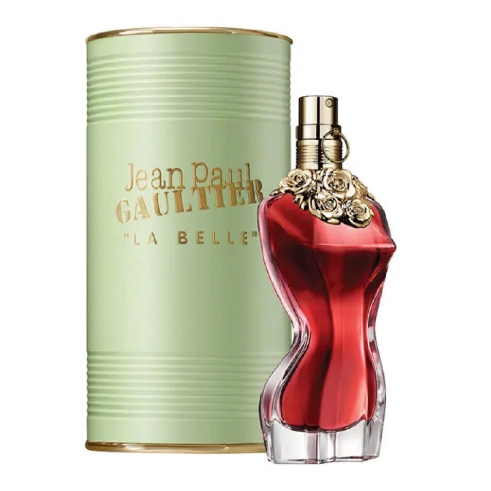 Roter Flakon in Frauenkörperform neben grüner Dose. Goldfarbener Verschluss. Aufschrift: Jean Paul Gaultier, La Belle.