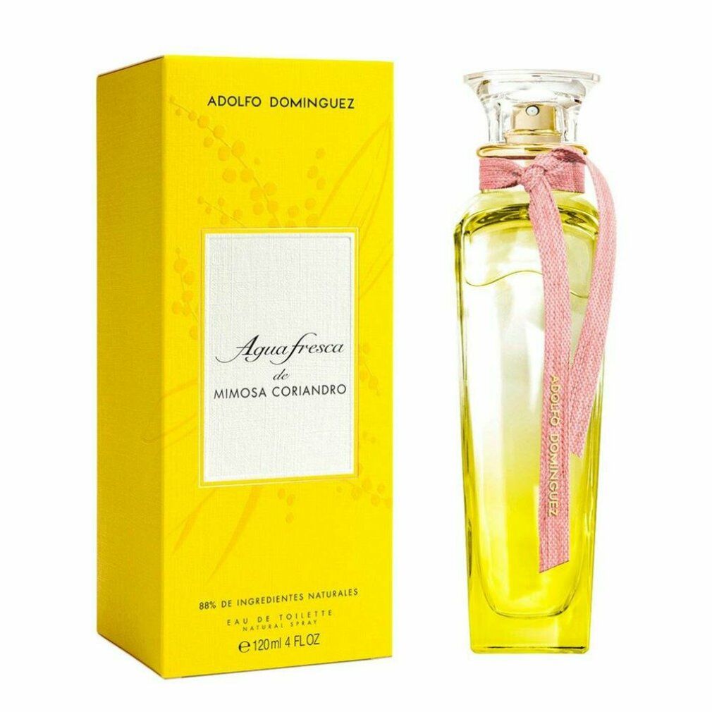 Gelbe Schachtel mit Flakon. Aufschrift: Adolfo Dominguez, Agua Fresca de Mimosa Coriandro. Flakon mit gelber Flüssigkeit, rosa Schleife.
