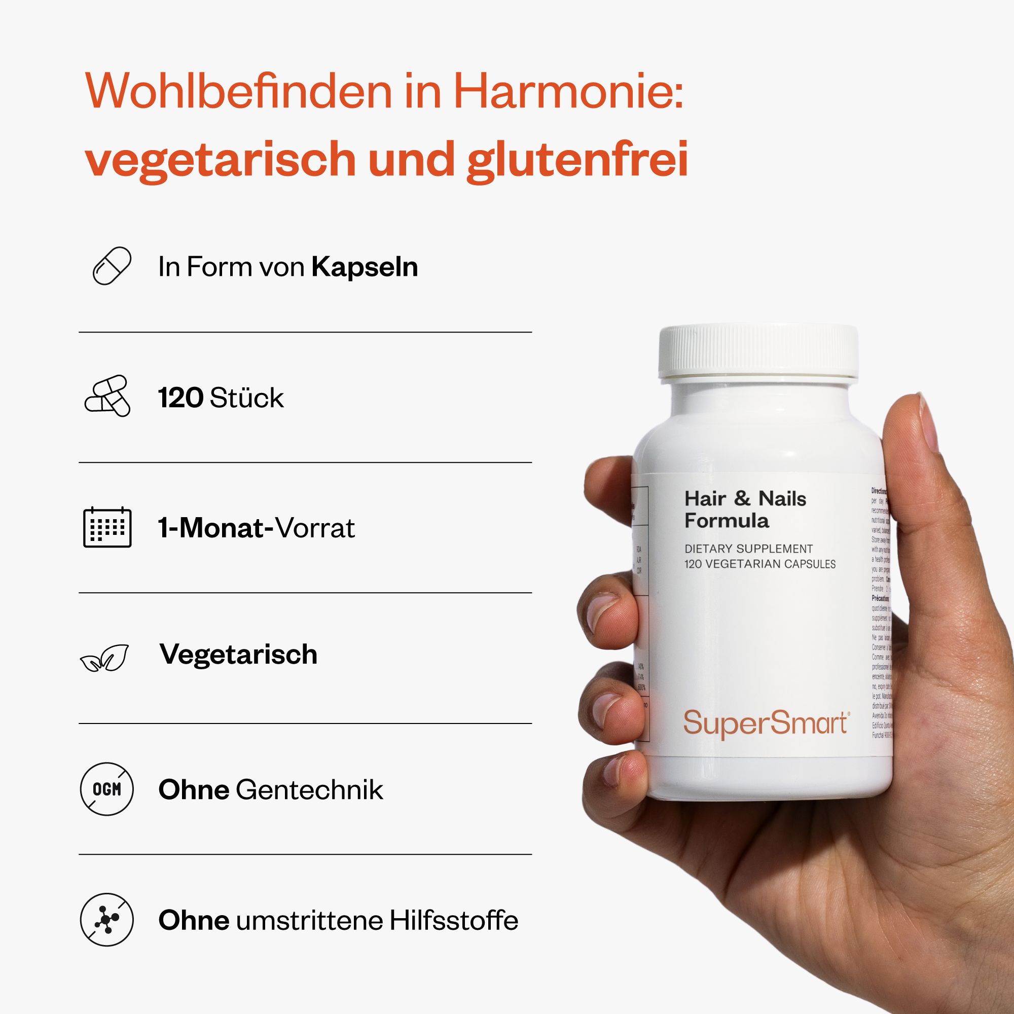 Hand hält eine weiße Flasche Haar- & Nagel-Formel. Text: 'Hair & Nails Formula', '120 Vegetarian Capsules', SuperSmart-Logo.