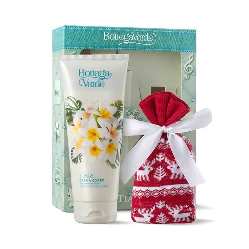Confezione regalo natalizia Bottega Verde. Include un tubetto di crema corpo e un piccolo regalo in un sacchetto rosso con nastro bianco. La crema si chiama Tiaré e mostra fiori sulla confezione.