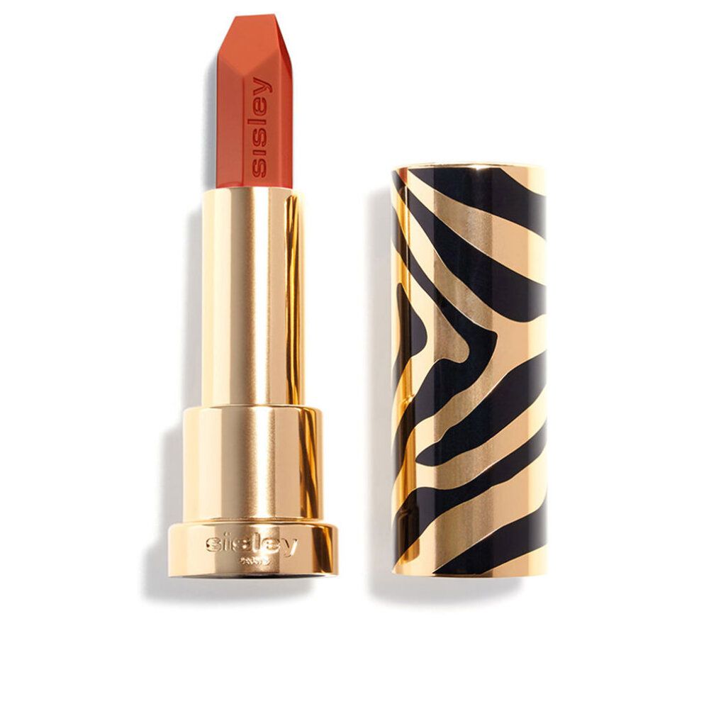 Geöffneter goldfarbener Lippenstift mit hellbraunem Lippenstift. Die Hülse hat ein schwarz-goldenes Zebramuster. Sisley-Schriftzug.