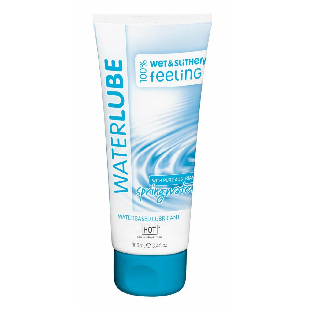 Weiß-blaue Tube. Aufschrift WATERLUBE, springwater, waterbased lubricant. 100ml. Mit blauem Schraubverschluss.