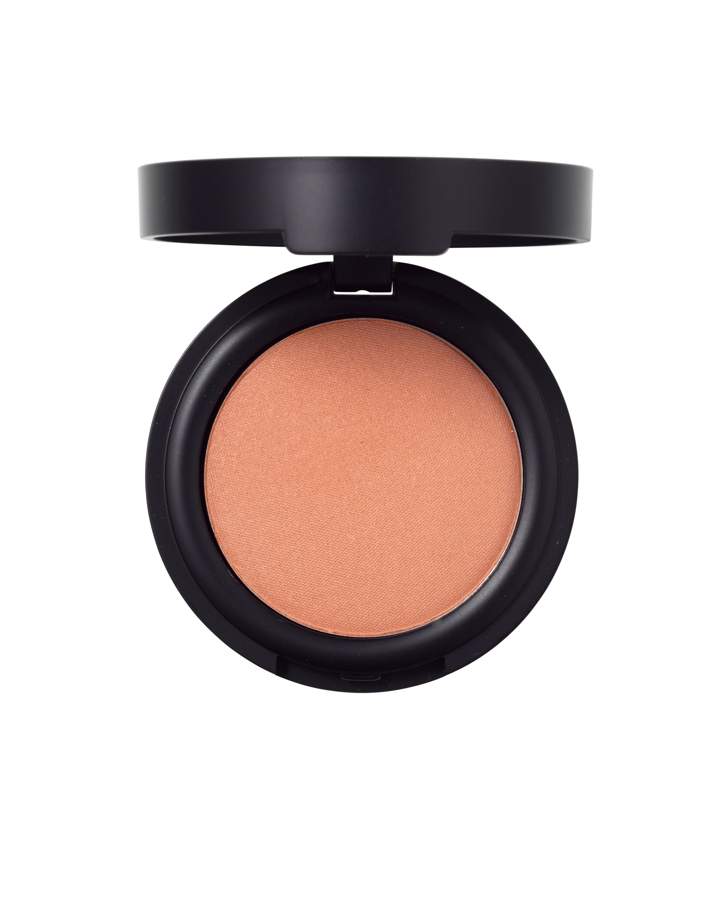 Ein runder, pfirsichfarbener Rouge-Puder in einem schwarzen Behälter mit offenem Deckel.