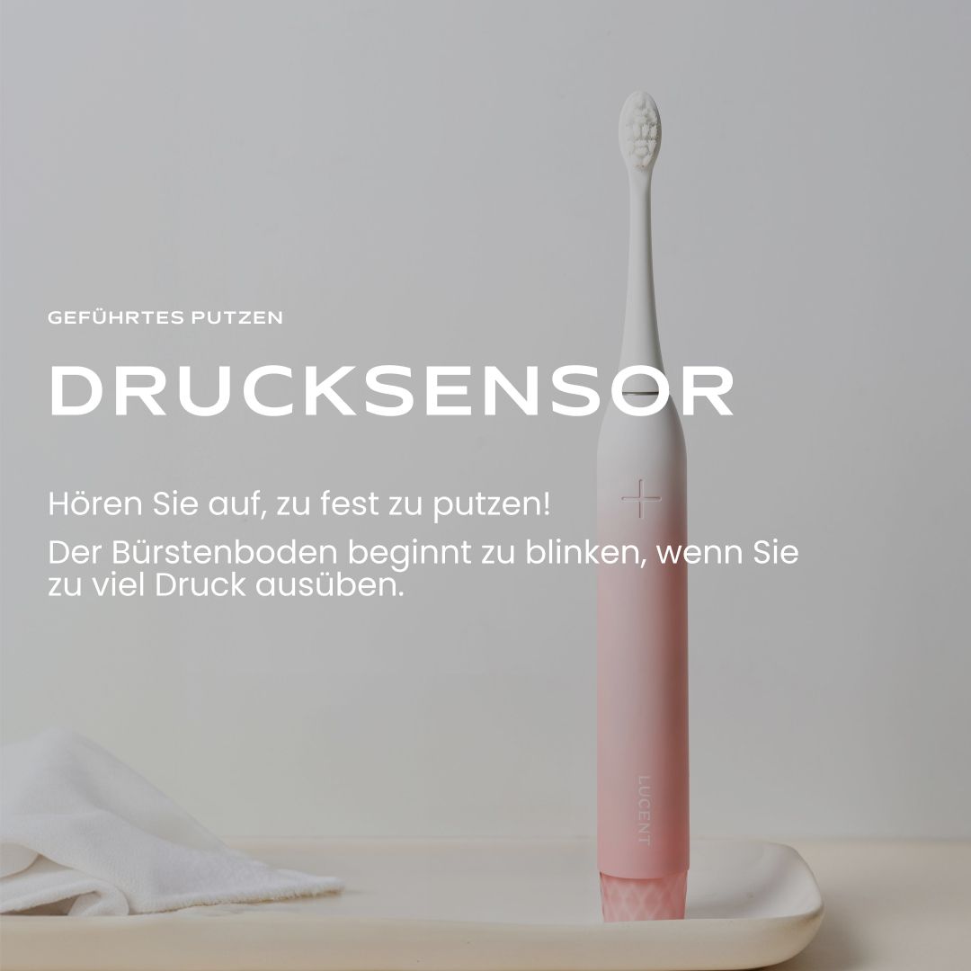 Be Lucent Prism Sonic Elektrische Zahnbürste in Rosa mit Drucksensor-Funktion.