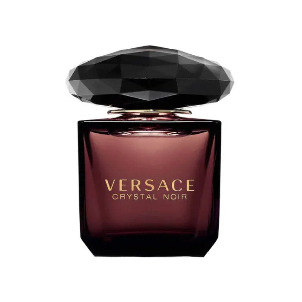 Versace Crystal Noir Flakon. Quadratischer Flakon mit facettiertem Deckel. Goldener Schriftzug 'VERSACE CRYSTAL NOIR'.