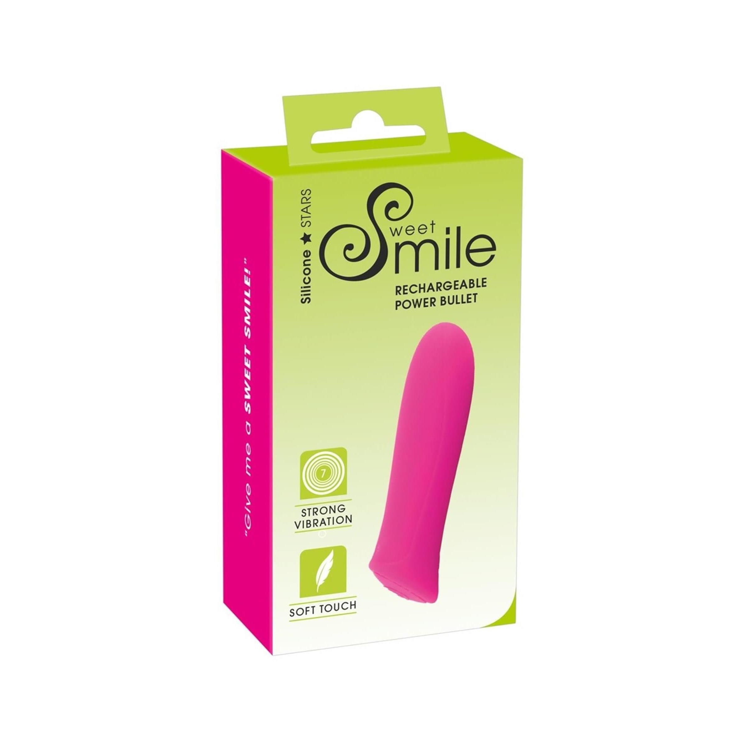 Pinkfarbener Vibrator in Verpackung. Aufschrift: Sweet Smile, Rechargeable Power Bullet. Verpackung in Grün und Pink.
