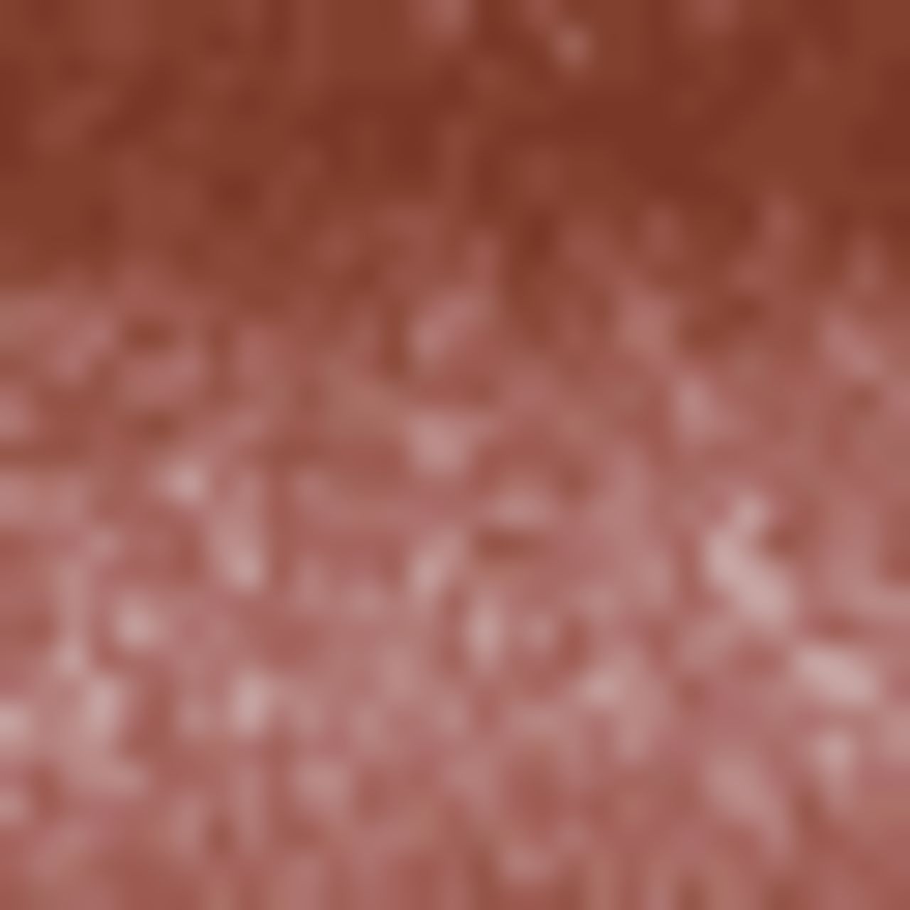 Verschwommene, braune Textur. Unschärfe, die auf eine Produktabbildung hindeutet.
