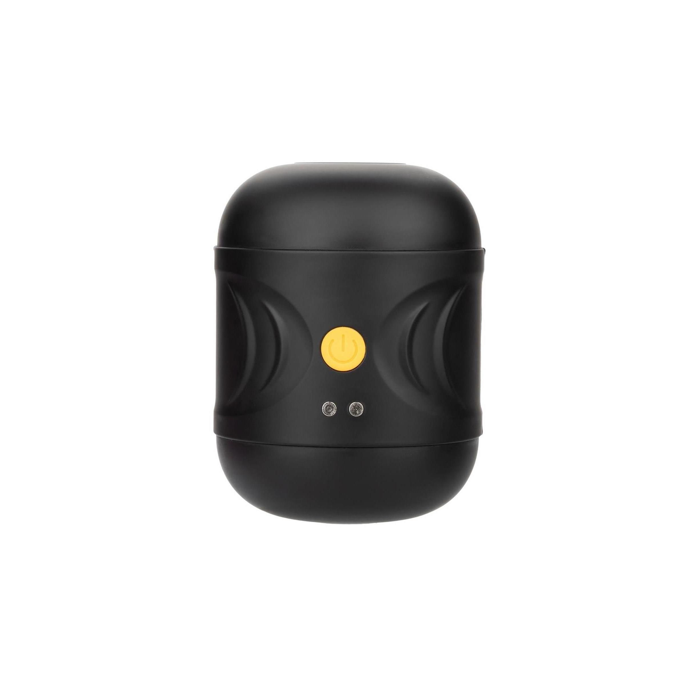 Schwarzes Gerät mit abgerundeten Enden. Gelber Knopf und zwei kleine Knöpfe. Für Intimität.