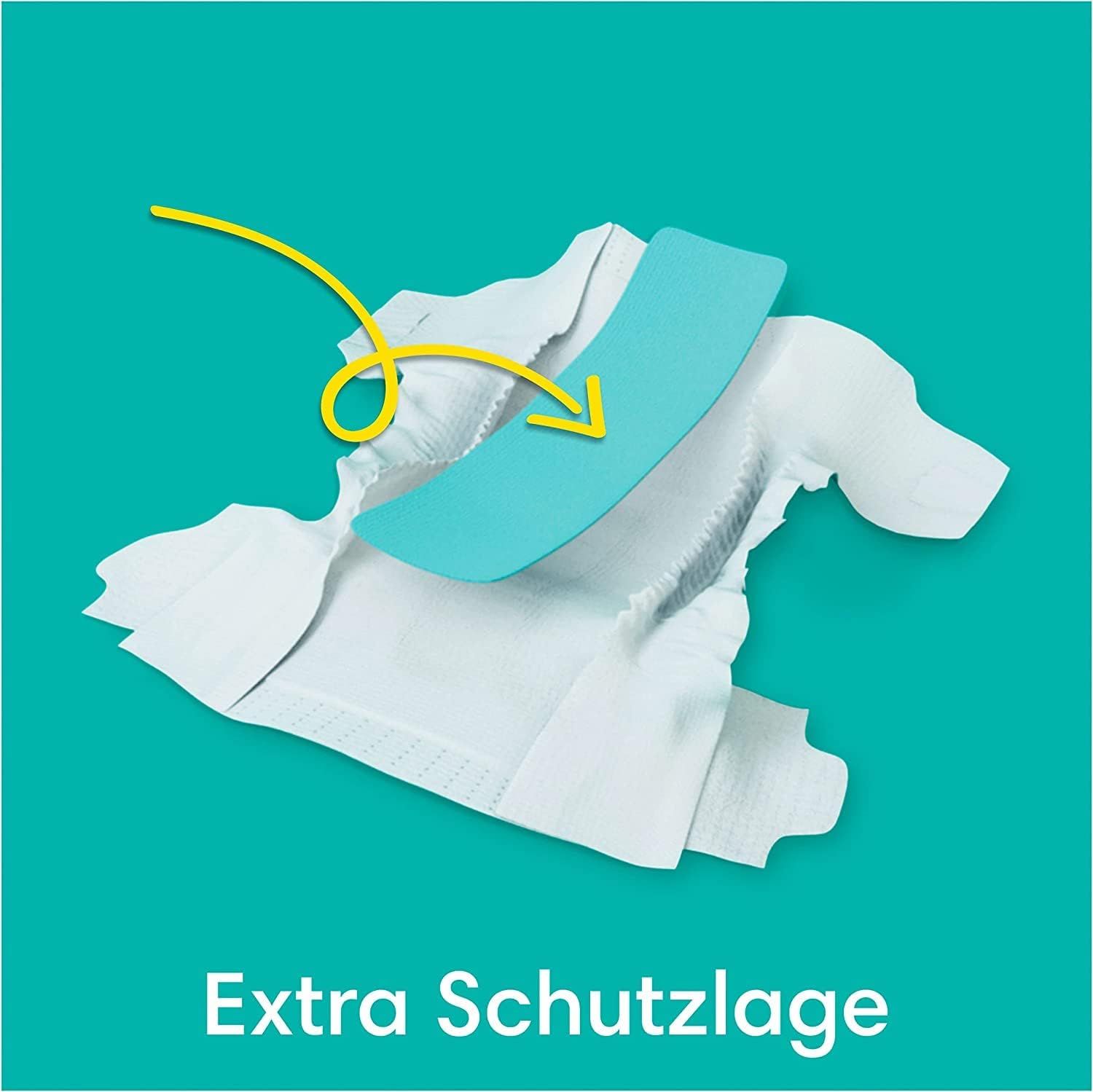 Pannolino Pampers Baby-Dry con strato protettivo blu evidenziato. Testo: Extra Schutzlage.