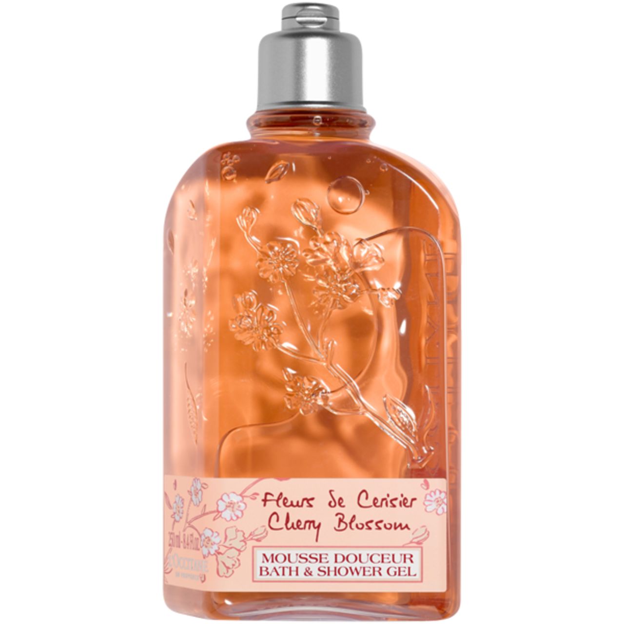 Kirschblüte Duschgel von L'Occitane. Transparente Flasche mit Blütenrelief. Aufschrift: Cherry Blossom, Mousse Douceur.