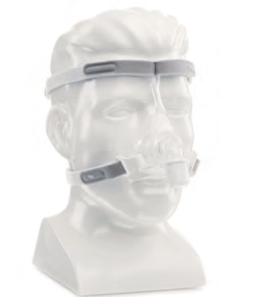 Gesichtsmaske mit Kopfband auf einem weißen Schaufensterpuppenkopf. Transparente Maske, graues Kopfband.