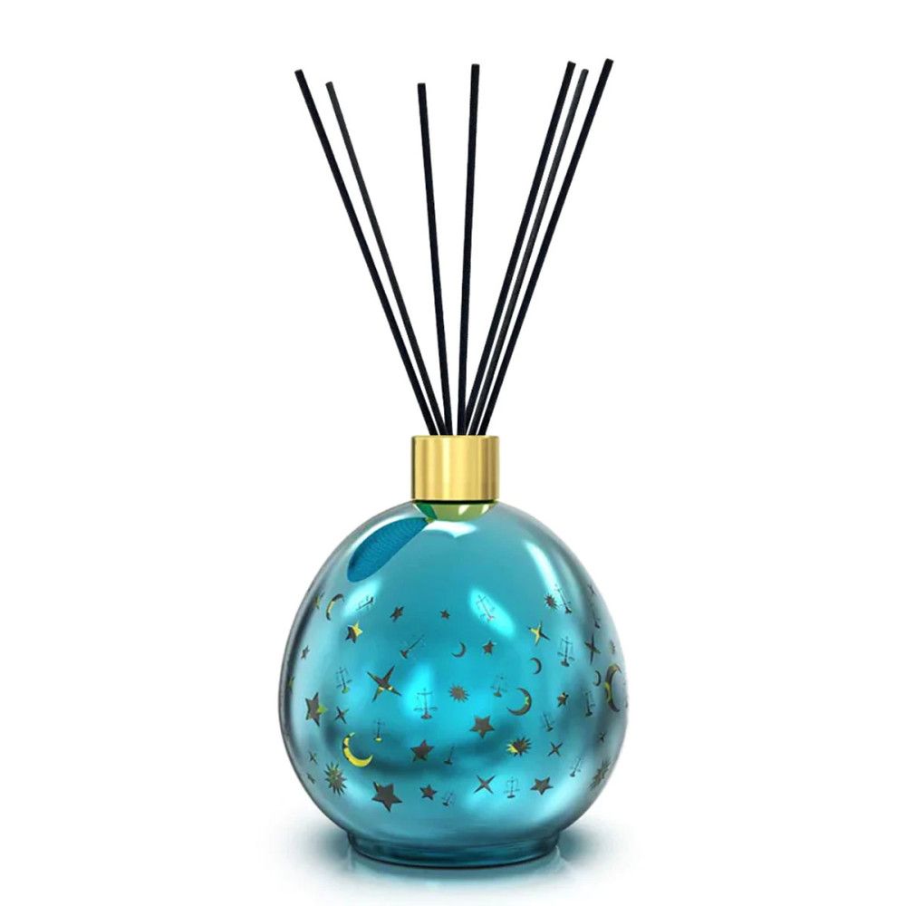 Blau-grüner Diffusor mit Sternen- und Mondmuster. Goldfarbener Hals, schwarze Stäbchen. Eiförmige Form.