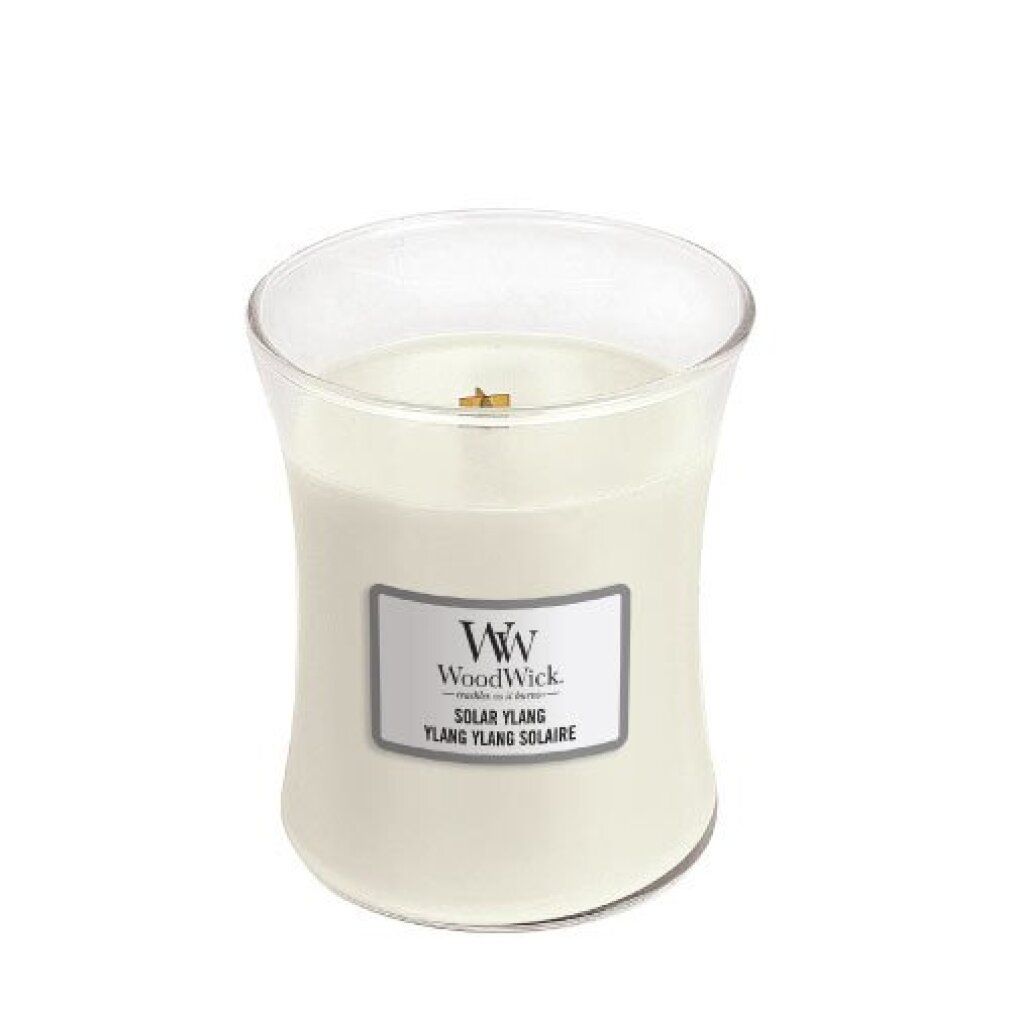 Sanduhrförmige Kerze ohne Deckel. Aufkleber mit "WoodWick Solar Ylang".