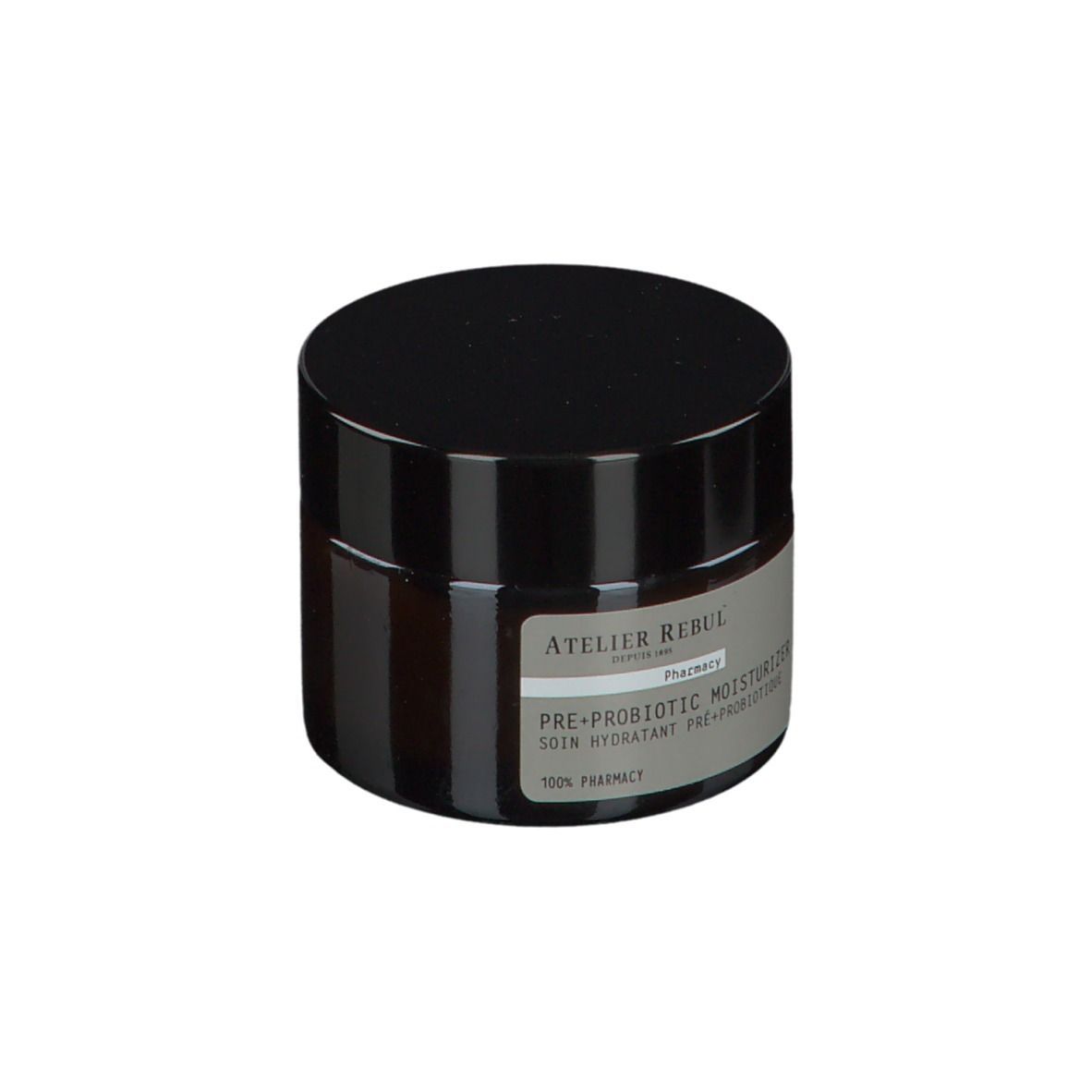 Bruine crèmepot met zwarte deksel. Op het etiket staat: ATELIER REBUL PRE+ PROBIOTIC MOISTURIZER.