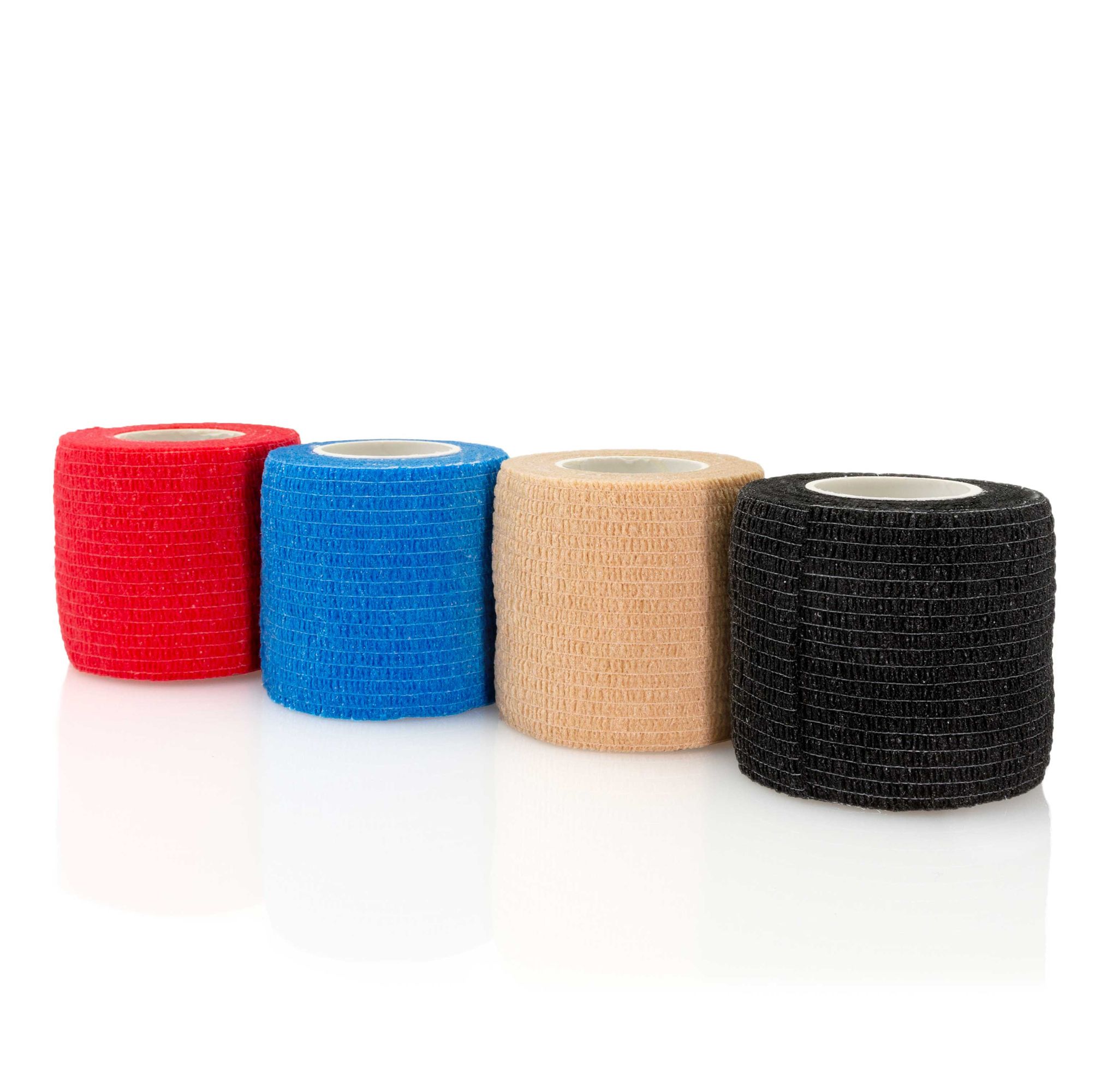 Vier gekleurde bandages: rood, blauw, beige en zwart. Zelfklevend, opgerold.