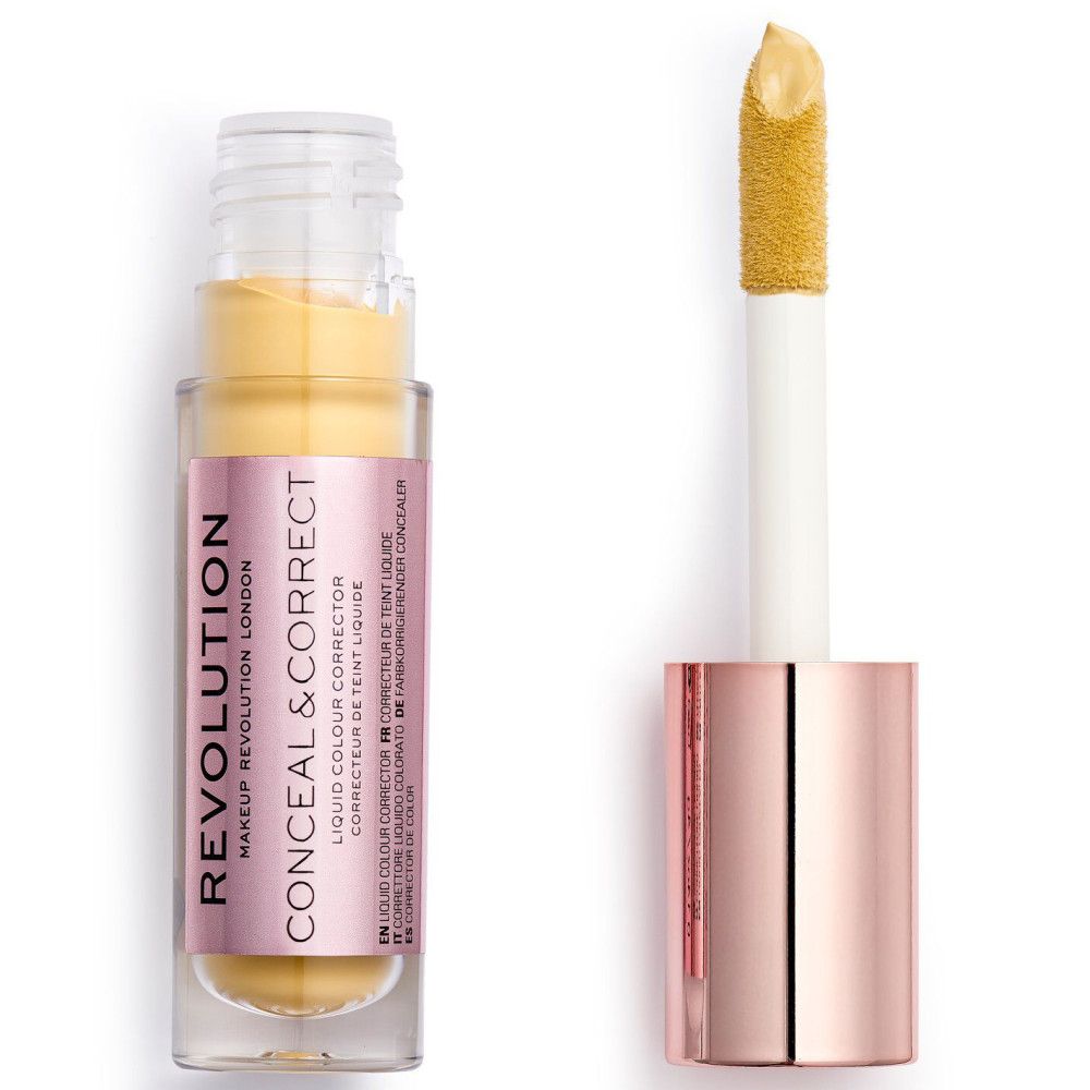 Makeup Revolution Concealer-Fläschchen mit Applikator. Rosa Etikett mit Text. Gelber Inhalt.