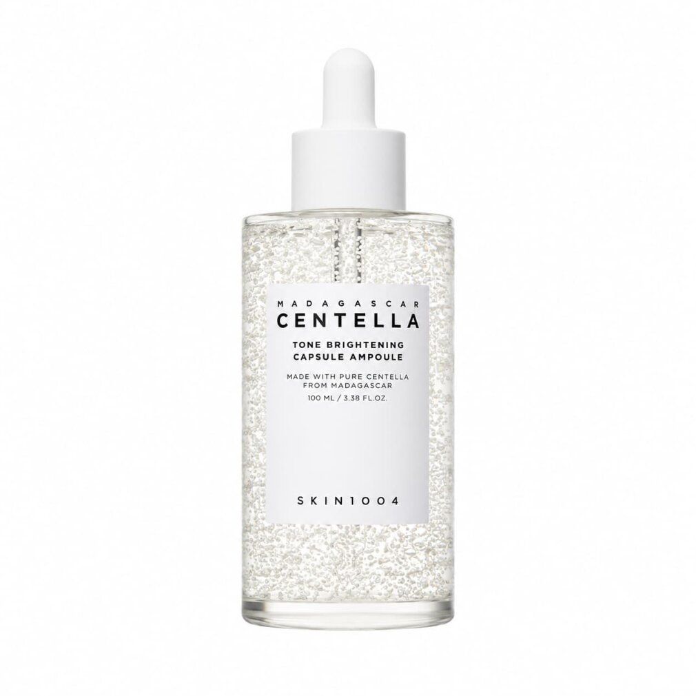 Flasche Madagascar Centella Tone Brightening Capsule Ampoule mit Pipette.