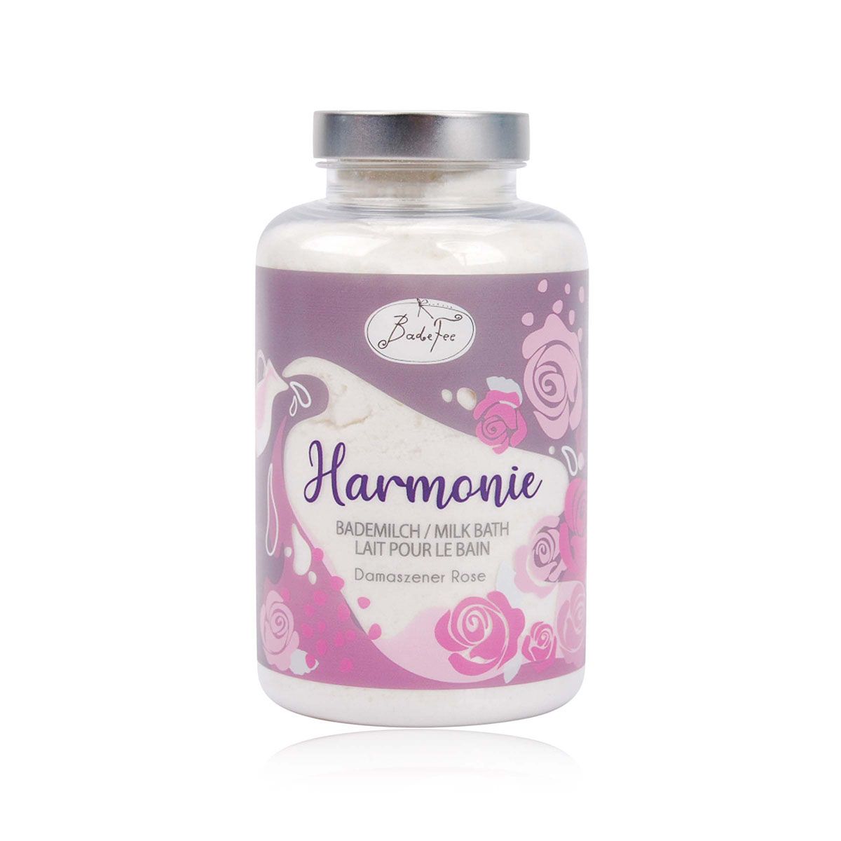 Zylindrische Glasflasche mit silbernem Deckel. Etikett mit Schriftzug "Harmonie" und Rosenmotiven. Produktname: Milchbad.