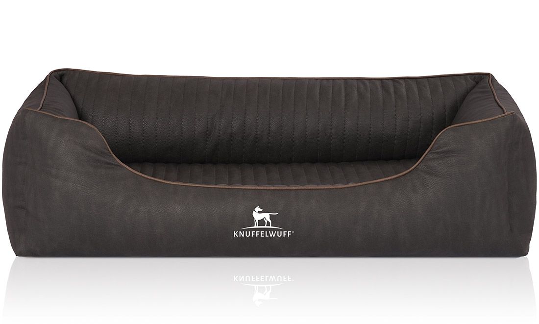 Orthopädisches Hundebett, dunkelgrau, rechteckig mit erhöhten Seiten. Logo: Knuffelwuff. Braune Ziernaht.